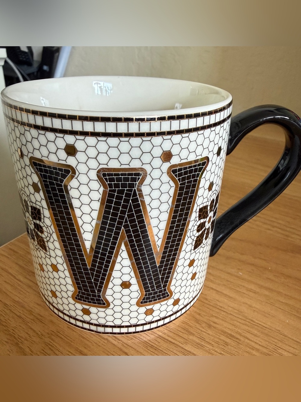 Anthropologie White Ceramic Mug with Black 'W' and Gold Accents